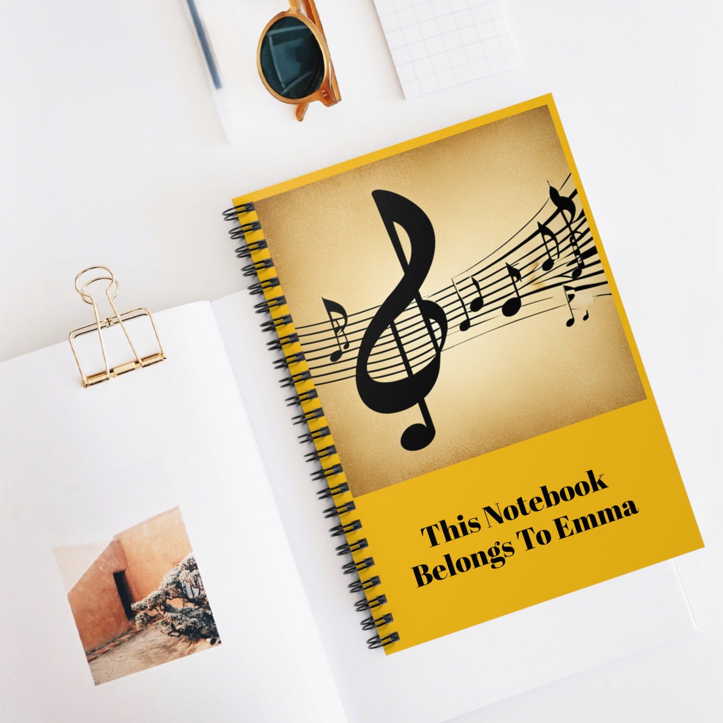 Personalized Spiral Notebook featuring a stylish music key design and your custom name. This notebook makes a thoughtful and unique gift.