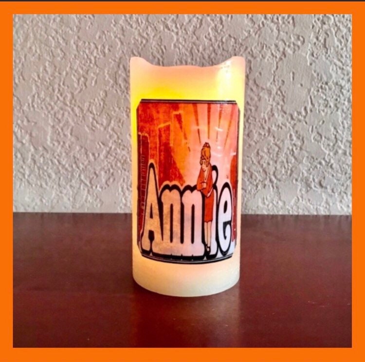 Broadway Annie Musical Theater Flameless Candle with Timer. Musical Theater Fan Will Love Their Broadway Candle Gift. Explore Now!