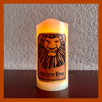 Broadway The Lion King Musical Real Wax - unscented Glowing Warm White LED candle w Timer. Perfect Gift for Yourself or others. Explore Now!