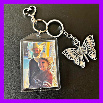 Personalized Double Photo Keychain. Includes Heart Shape Silver Medal Keychain Snap Clip with Silver Tone Butterfly Keychain.